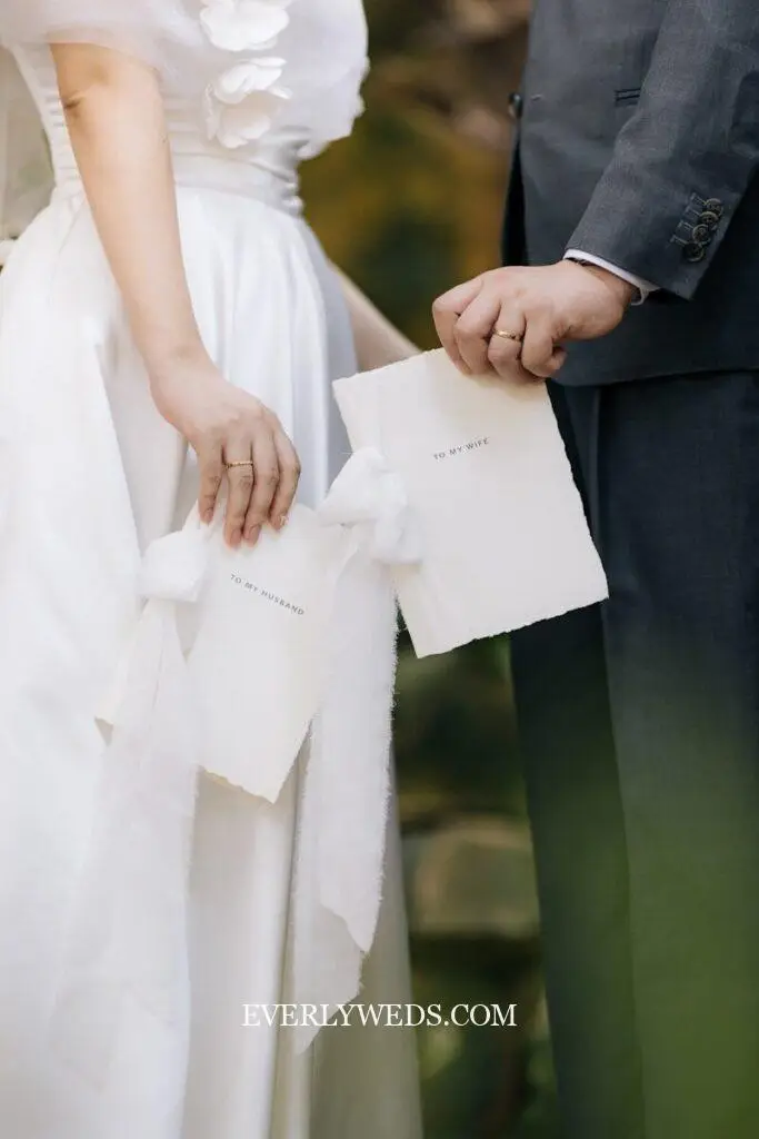 A man and a woman standing next to each other