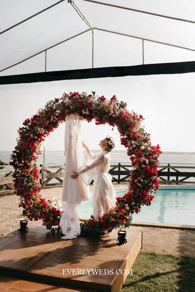 floral hoop geometric wedding entrance decor accent with white flowers and greenery modern ceremony entrance decoration