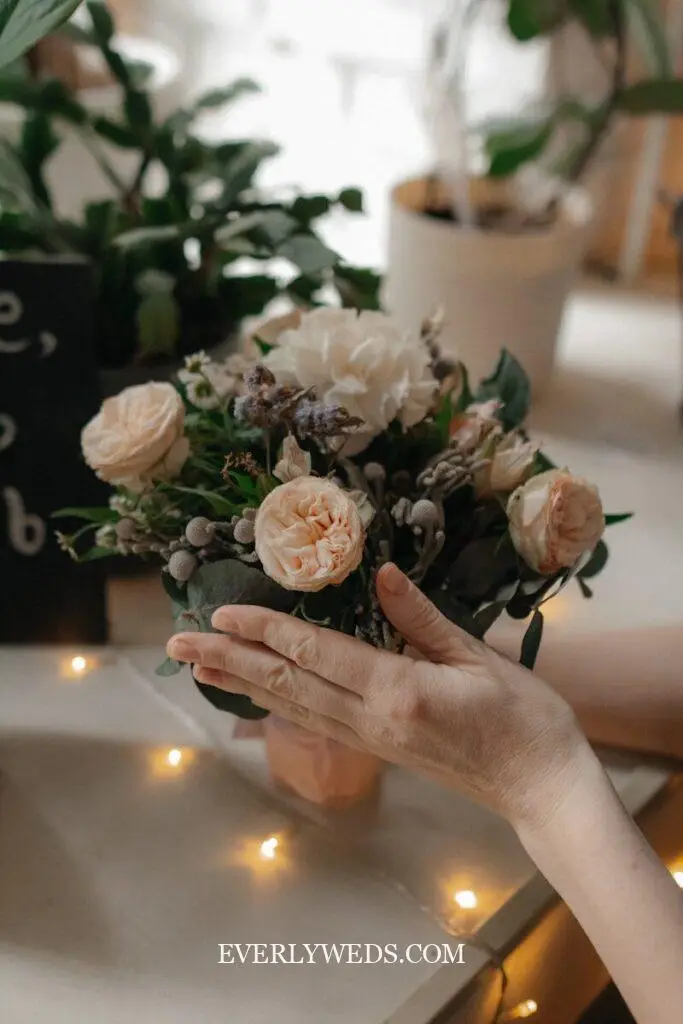 diy wedding bouquet fake flowers bridesmaid white roses eucalyptus hand tied round bouquet