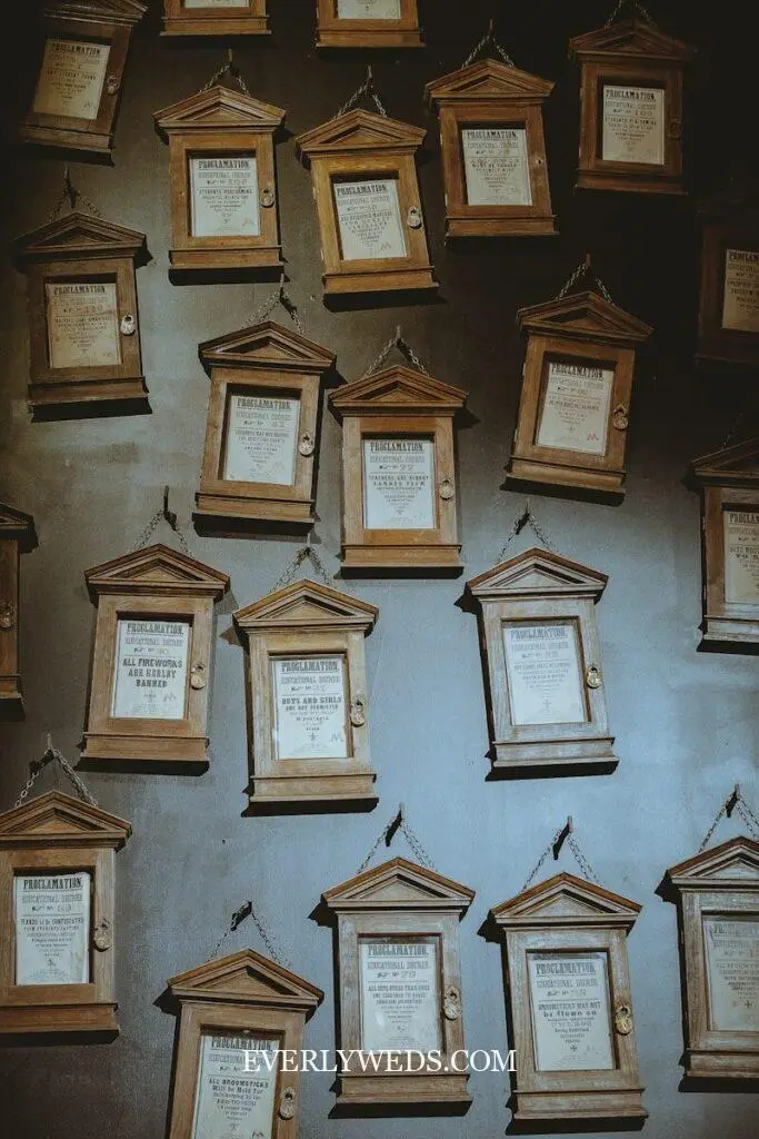 rustic wedding set up seating chart display with antique frame and floral accents