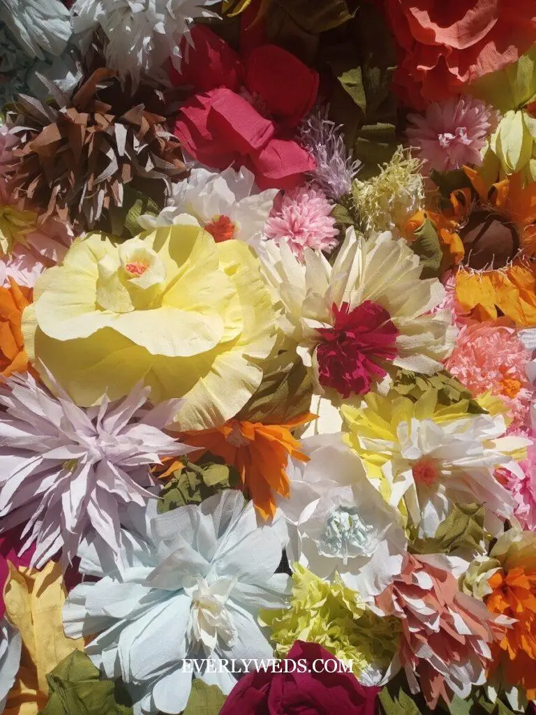 DIY paper flower bridesmaid bouquet made from book pages and sheet music as unique wedding bou