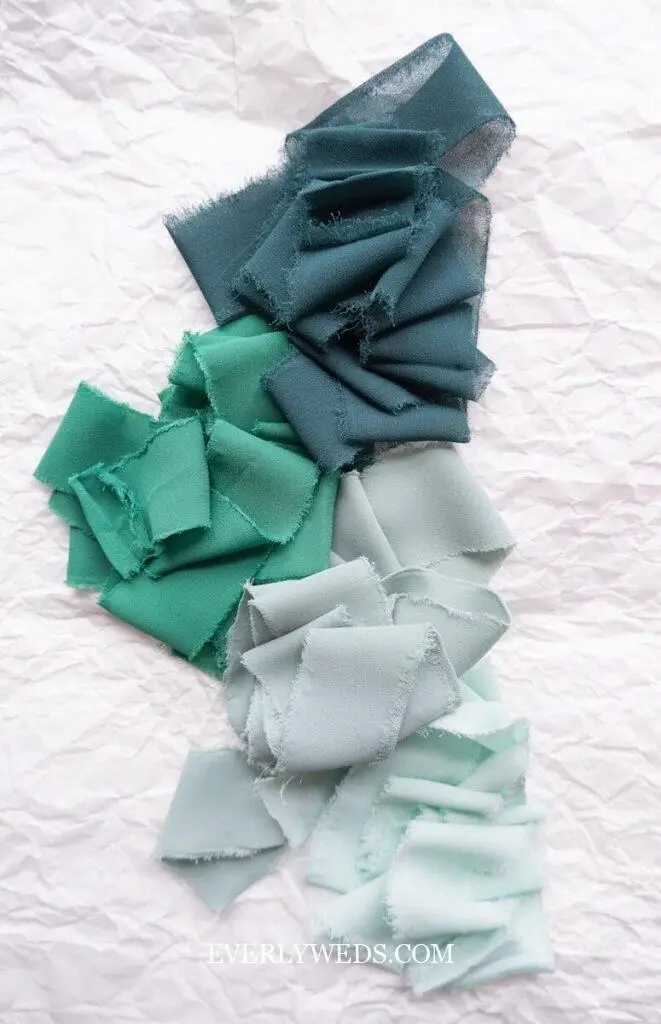 Green wedding theme seasonal color palette ideas showing sage green spring wedding, emerald green fall wedding, mint green summer wedding, and forest green winter wedding color schemes