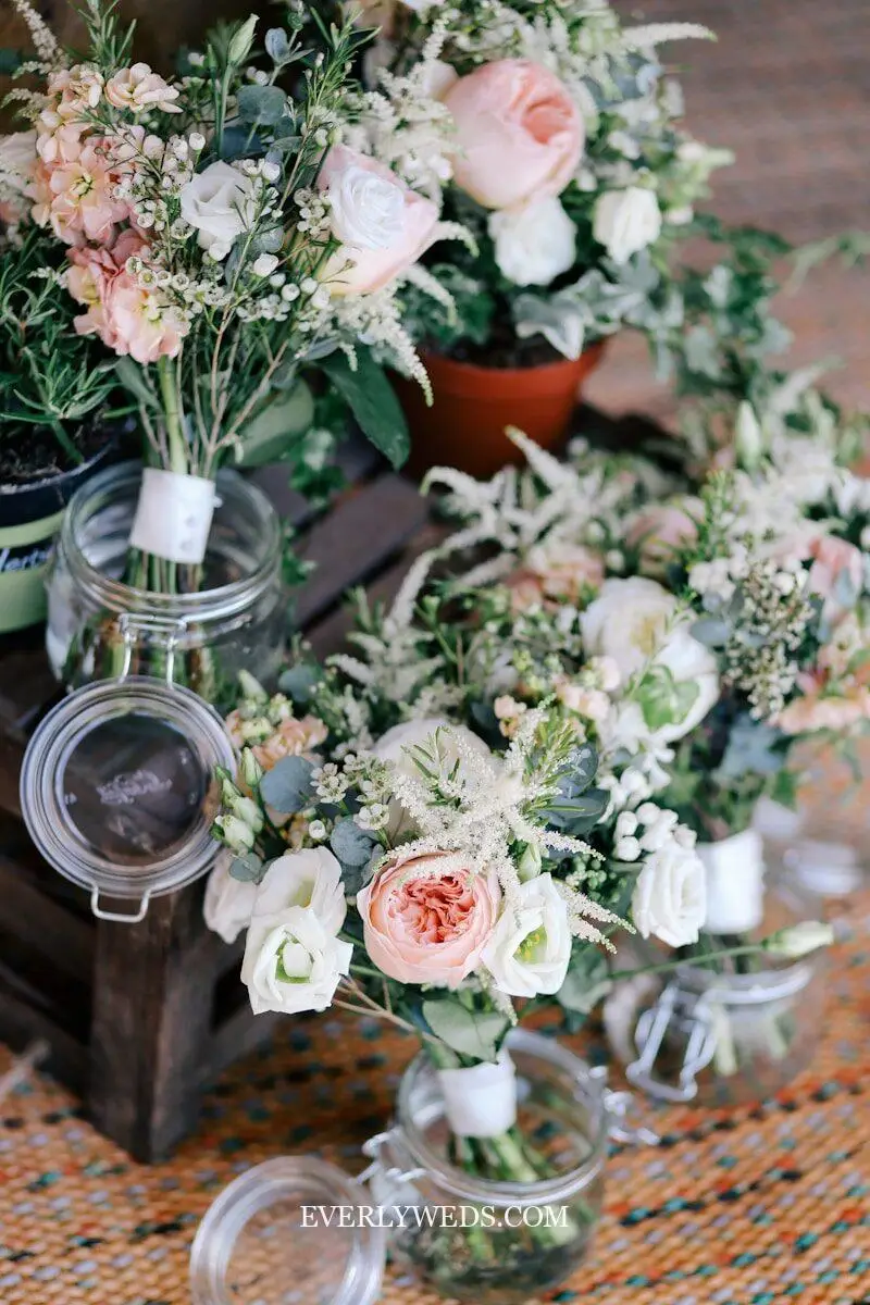 dream wedding decorations flowers repurposed bridesmaid bouquets in mason jars as elegant wedding reception ideas centerpieces