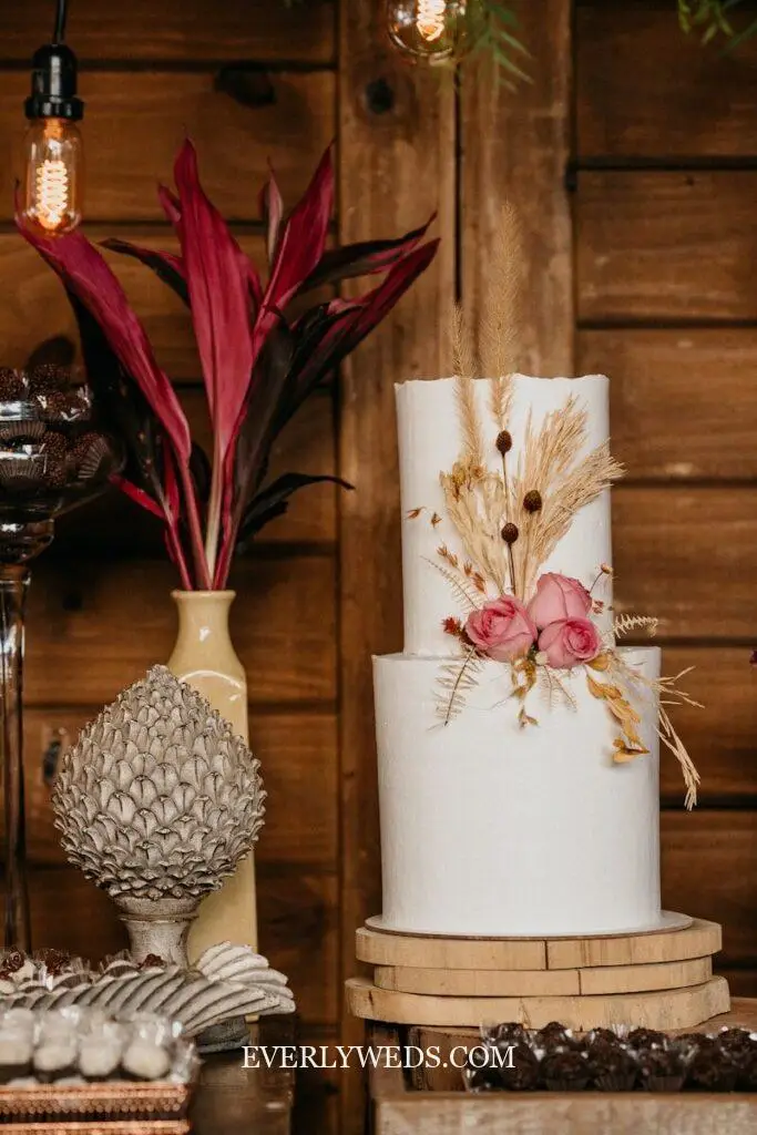 white and red flowers in vase