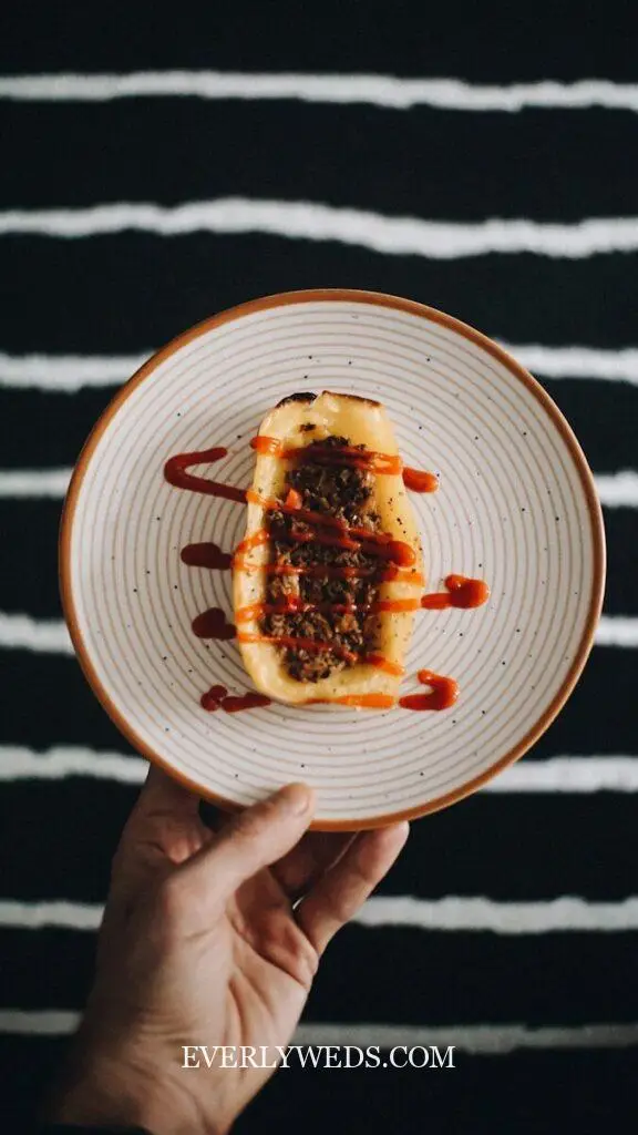 a person holding a plate with food on it