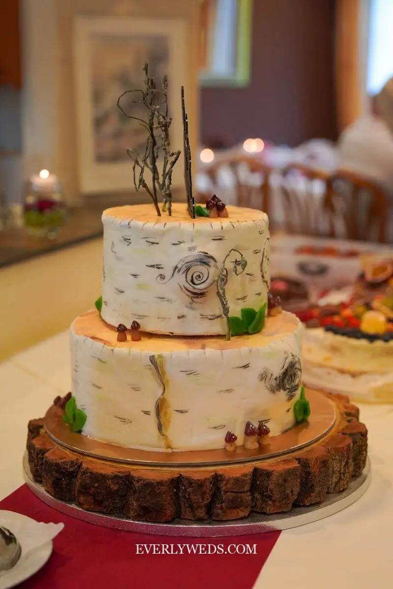 birch inspired rustic wedding cake design with bark texture fondant and woodland floral topper for barn wedding