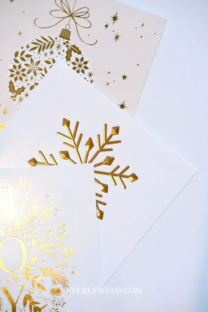 Gold foil Christmas ornament and snowflake save the date cards for winter wedding ideas