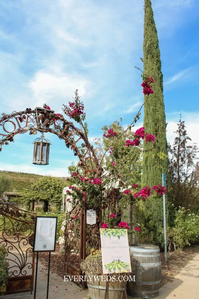A Rustic Welcome Sign At The Venue Entrance